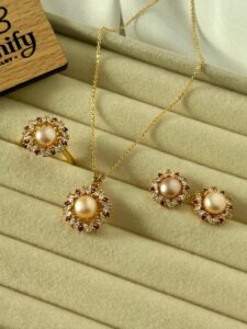 Peach Pearl Halo Jewelry Set – Pendant, Earrings & Ring | Gold-Tone Red & White Stone Design