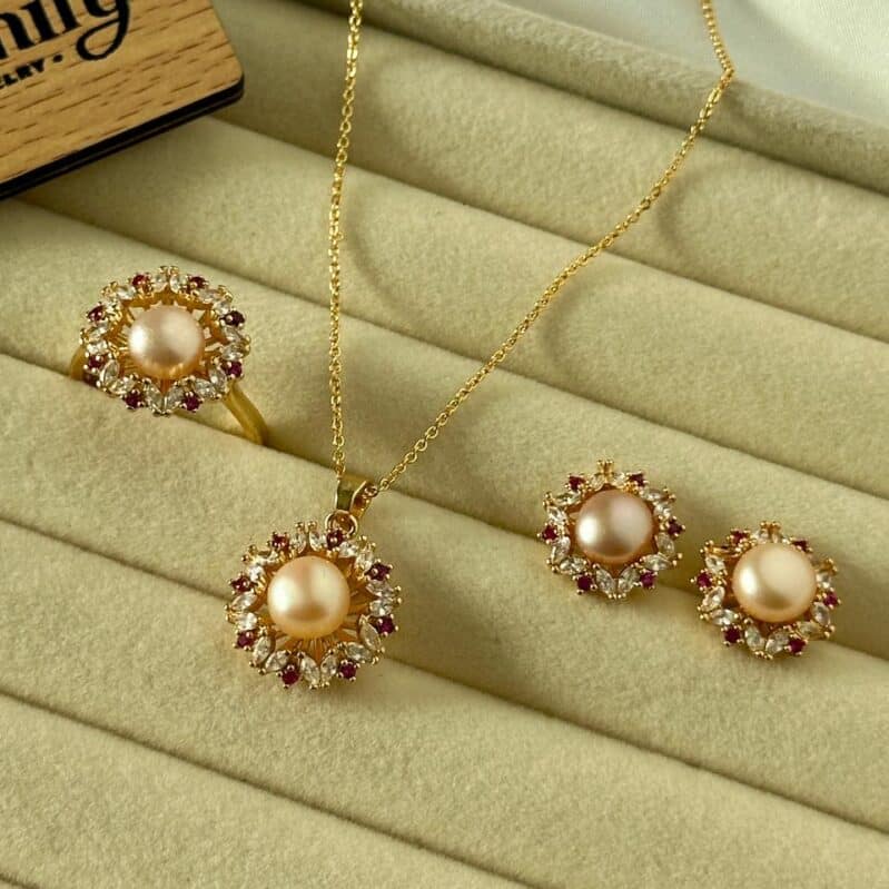 Peach Pearl Halo Jewelry Set – Pendant, Earrings & Ring | Gold-Tone Red & White Stone Design
