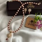 Pink Rice Pearl Necklace Set with Ruby Accents