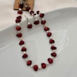 Red uncut pearl necklace with white pearls and matching earrings, 17 inch
